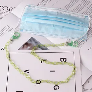 Detail of light green acrylic mask chain with lobster clasps and adjustable silicone loops
