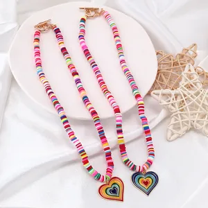 Rainbow polymer clay beaded necklace with gold heart pendant and OT clasp closure