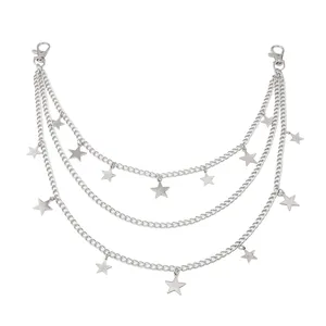 Detail of silver layered punk pants chain with star pendants and lobster clasps