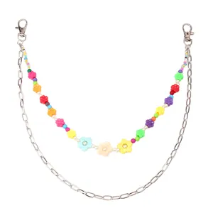 Detail of colorful flower beaded waist chain with silver metal lobster clasps and link chain