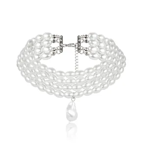 Detail of four-layer pearl choker with large baroque pearl pendant and silver clasp