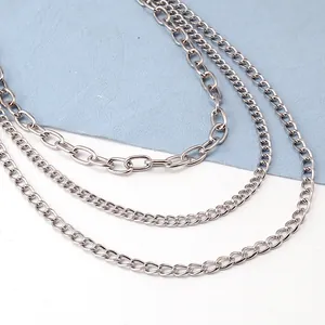 Macro view of silver multi-layer metal waist chains with hip-hop punk style linked rings
