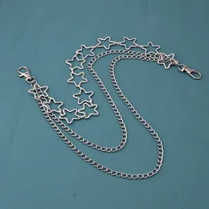 Close-up of triple-layer silver metal pants chain with hollow star links and lobster clasps