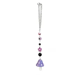 Porte-clés champignon violet avec œil maléfique et breloque étoile sur chaîne