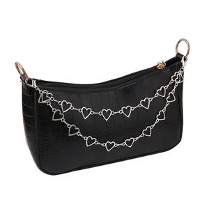 Black faux crocodile leather underarm bag with decorative silver heart-shaped chain links