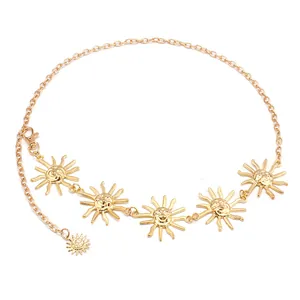 Gold bohemian metal waist chain featuring sun pendants with smiling face relief details