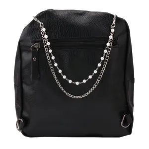 Close-up of black litchi grain faux leather bag with pearl and silver metal chain detail