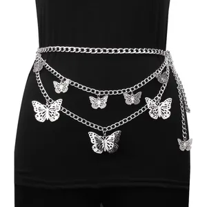 Silver multi-layer metal waist chain featuring hollow butterfly pendants on black outfit
