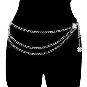 Three-layer silver metal chain belt with vintage floral buckles on black silhouette background