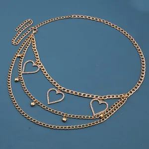 Three-layer gold metal waist chain featuring hollow heart charms and rhinestone details
