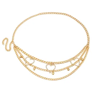 Gold multi-layer waist chain featuring hollow rhinestone hearts and small charms