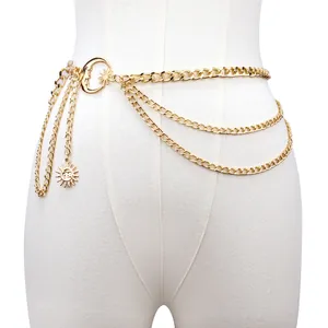 Multilayer gold celestial waist chain belt with sun and moon pendants on a mannequin