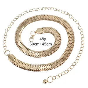 Flat snake bone chain metal waist belt in gold with lobster clasp and ball pendant