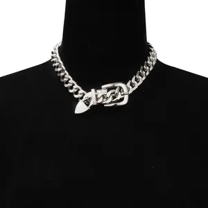 Silver chunky Cuban chain necklace with a belt buckle closure on a black mannequin