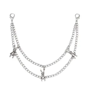 Detail of silver double-layered metal bag chain with gothic rabbit charms and lobster clasps