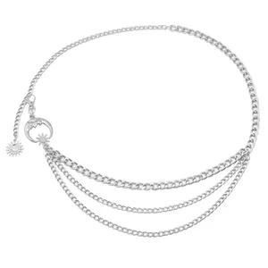 Detailed view of silver layered metal waist chain featuring crescent moon and sun pendants