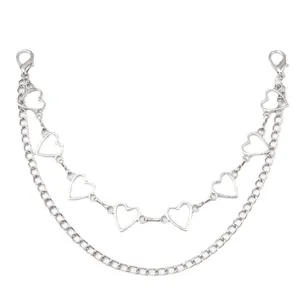 Detail of silver dual-layer metal chain with heart links and curb design for bags