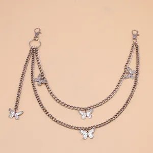 Detail of silver multilayered alloy hip-hop waist chain featuring five butterfly pendants