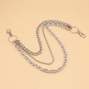 Detail of a multi-layer punk metal pant chain with silver beads and lobster clasps