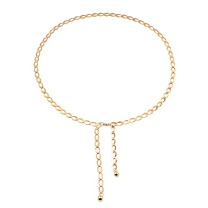 Modieuze gouden metalen tailleketting met ovale schakels en ronde kraalhangers