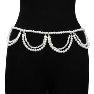 Elegant multi-layer pearl waist chain featuring white fringe tassels for dresses