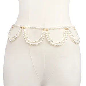 Elegant multi-layer pearl waist chain for women with golden metal accents and drape effect