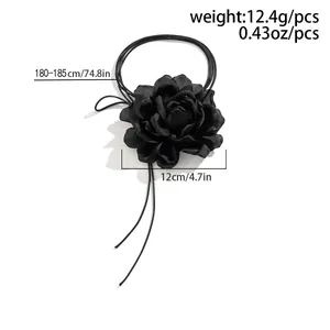 Detailed view of black fabric 3D flower choker with dimensions and extra long straps
