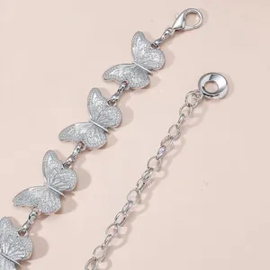 Silver metal butterfly pants chain with matte texture links and adjustable lobster clasp