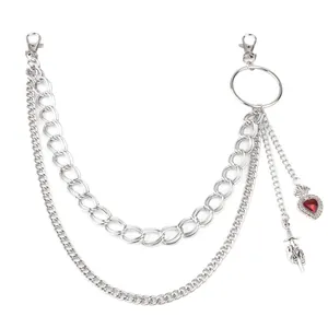 Double-layered silver pant chain with red heart gemstone and dagger pendant accessories
