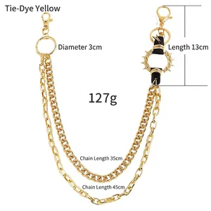 Detail of double gold punk pant chain with spiked leather and size specifications
