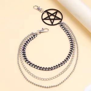 Detailed close-up of triple-layered silver hip-hop pants chain with black pentagram star