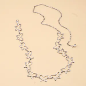 Close-up of hollow butterfly silver waist chain with lobster clasp and adjustable ball chain