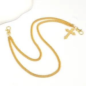 Hip hop style gold cross pant chain with dual lobster clasps and engraved cross pendant