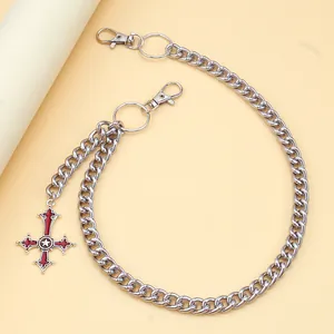 Detail of punk silver pants chain with red cross pendant and durable lobster clasps