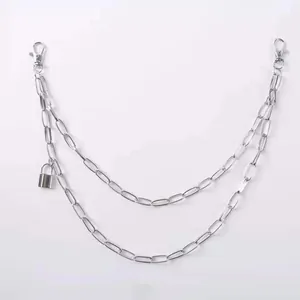 Detail of silver punk butterfly double chain with metal lock pendant and lobster clasps
