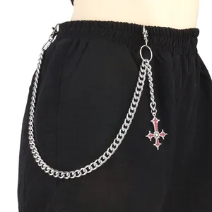 Silver punk pants chain with a red gothic cross pendant and lobster clasps on black trousers