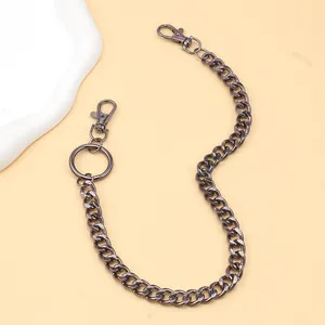 Macro shot of dark gunmetal box chain with sturdy lobster clasps and ring detail