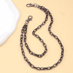 Detailed view of gunmetal box chain featuring oval links and large swivel lobster clasps