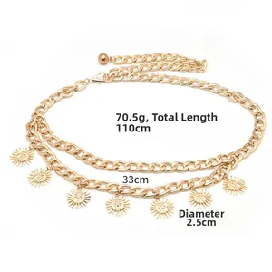 Detail of double-layer gold waist chain featuring sun charms and lobster clasp