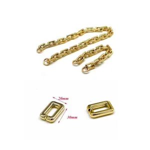 Detailed view of 20mm x 30mm golden metal chain links with dimensions for handbags