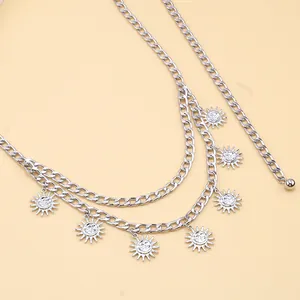Silver multilayer metal waist chain with sun pendants and rhinestone accents