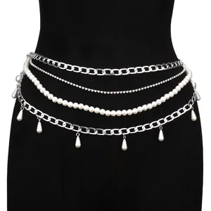 Close-up of multi-layer body chain with silver links, rhinestones and faux pearls