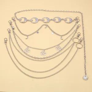 Detail of silver layered waist chain with moon, star and sun celestial charms