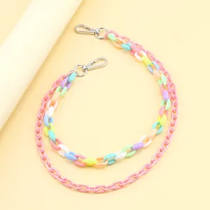 Detail of candy-colored double-layer acrylic pants chain with metal lobster clasps