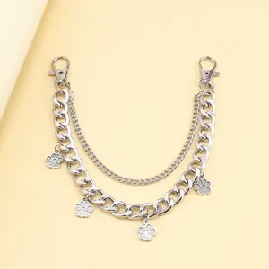 Detail of silver dual-layer metal chain with dog paw pendants and lobster clasps