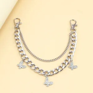 Detail of silver dual metal bag chain with rhinestone butterfly pendants and lobster clasps