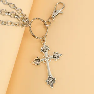 Gothic silver metal cross wallet chain with lilies and sparkling rhinestone accents