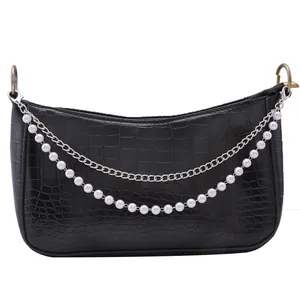 Black faux crocodile leather crescent bag with decorative silver and pearl chains
