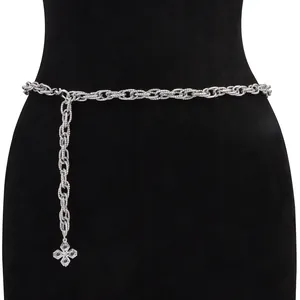 Elegant silver metal chain belt featuring textured rings and a decorative cross pendant