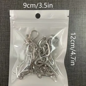 Silver metal chain accessory with cross pendant in 9x12cm transparent plastic packaging